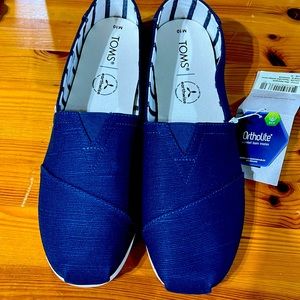 Tom’s Men’s canvas slip on shoes